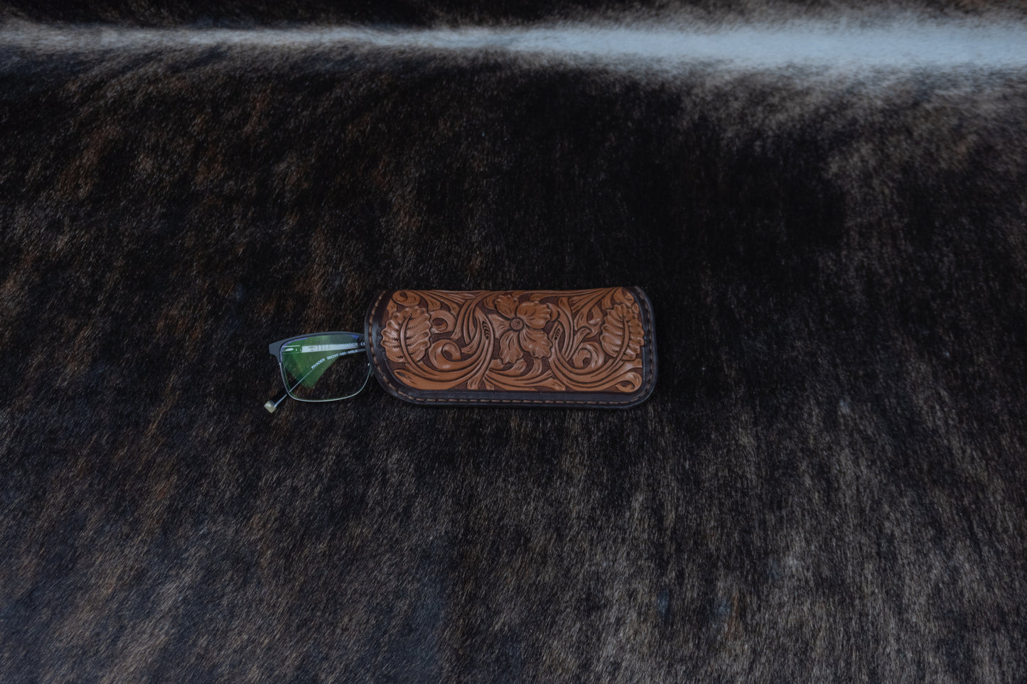 Example of the readers eyeglass case Sheriadan tooled. 